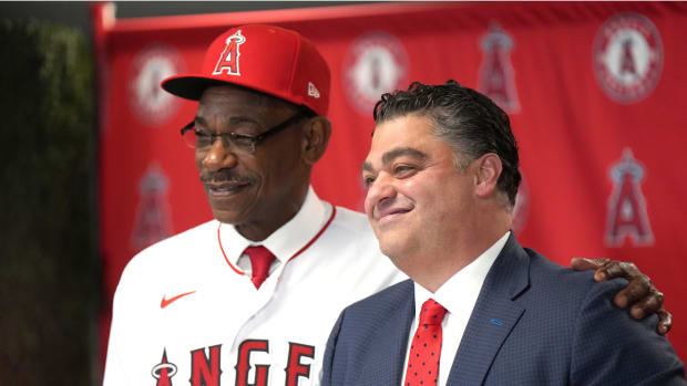 Nov 15, 2023; Anaheim, CA, USA; Los Angeles Angels manager Ron Washington (left) poses with general manager Perry Minasian at introductory press conference at Angel Stadium of Anaheim. Mandatory Credit: Kirby Lee-USA TODAY Sports  